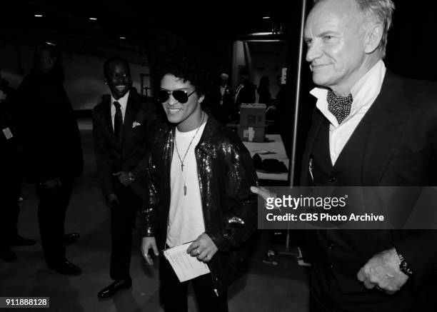 Bruno Mars and Sting backstage at THE 60TH ANNUAL GRAMMY AWARDS broadcast live on both coasts from New York City's Madison Square Garden on Sunday,...