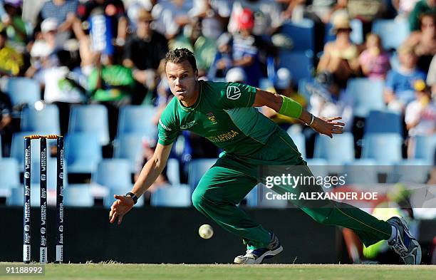 South Africa's Johan Botha dives in an attempt to catch the ball during The ICC Champions Trophy match between England and South Africa at the...