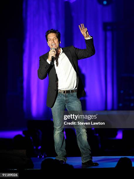 Comedian/actor Dane Cook performs at the 14th annual Andre Agassi Charitable Foundation's Grand Slam for Children benefit concert at the Wynn Las...
