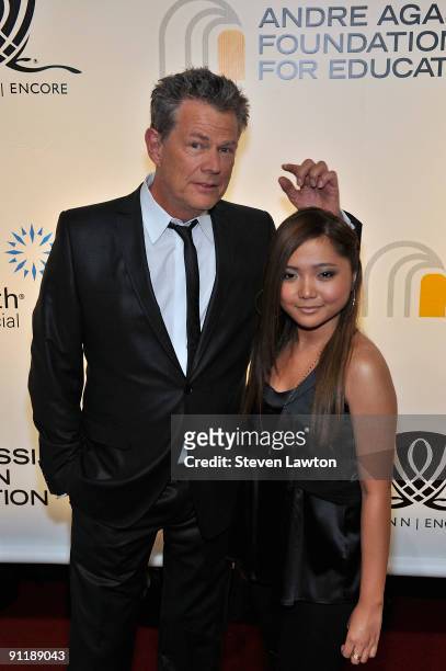 Producer/composer David Foster and singer Charice Pempengco arrive at the 14th annual Andre Agassi Charitable Foundation's Grand Slam for Children...