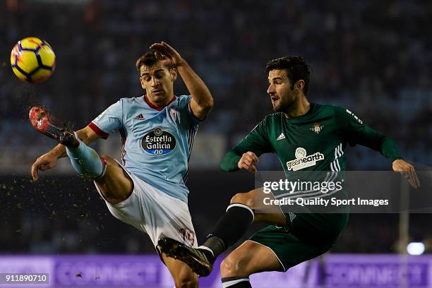 Jonny Castro of Celta de Vigo competes for the ball with Antonio Barragan of Real Betis during the La Liga match between Celta de Vigo and Real Betis...