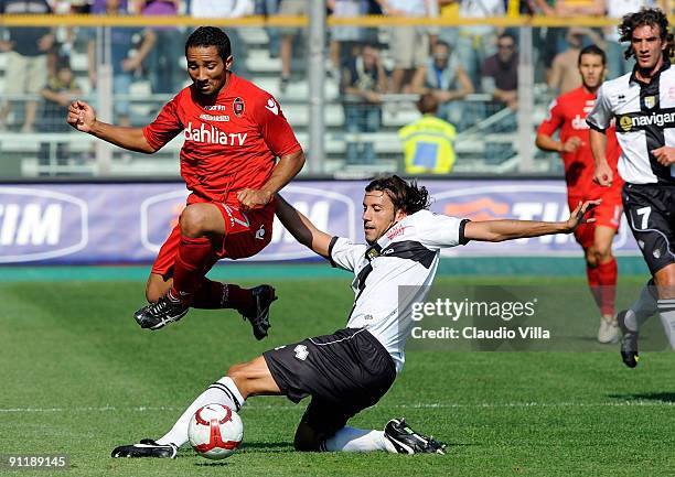 Cristian Zaccardo of Parma FC competes for the ball with Jedaias Jeda of Cagliari Calcio during the Serie A match between Parma FC and Cagliari...