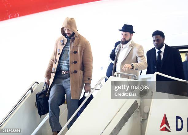 Kyle Van Noy,James Develin and Dwayne Allen of the New England Patriots arrive for Super Bowl LII on January 29, 2018 at the Minneapolis-St. Paul...