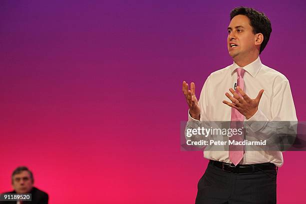 Prime Minister Gordon Brown watches Energy Secretary Ed Miliband speak at the Labour Party Conference on September 29, 2009 in Brighton, England....