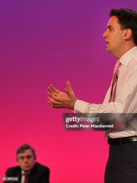 Prime Minister Gordon Brown watches Energy Secretary Ed Miliband speak at the Labour Party Conference on September 29, 2009 in Brighton, England....