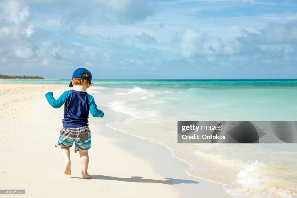 Baby Boy Walking on Tropical Beach, Cayo Coco, Cuba