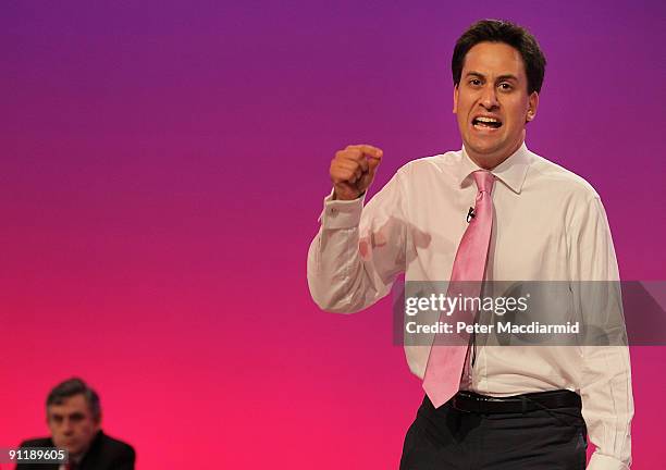 Prime Minister Gordon Brown watches Energy Secretary Ed Miliband speak at the Labour Party Conference on September 29, 2009 in Brighton, England....