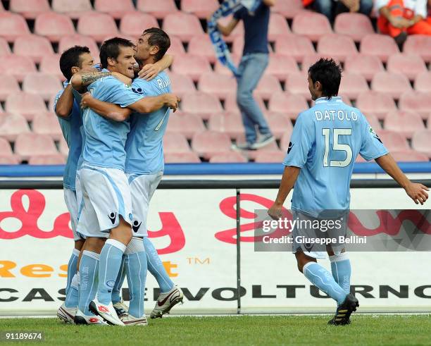 Marek Hamsik and the players of SSC Napoli celebrate the goal 1-0 during the match between SSC Napoli v AC Siena at Stadio San Paolo on September 27,...