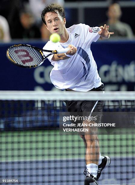 German Philipp Kohlschreiber returns the ball to his French opponent Gael Monfils during the ATP Moselle Open Tennis tournament in Metz, eastern...