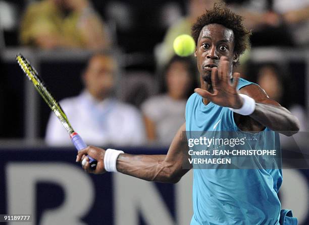 French Gael Monfils looks at the ball during his match against German Philipp Kohlschreiber during the ATP Moselle Open Tennis tournament in Metz,...