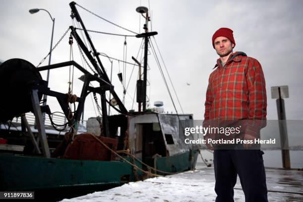 Meet: Cooper Van Vranken, poses for a portrait next to the scallop dragger E Cosi II on the Peaks Island waterfront near his home. Van Vranken is...