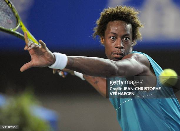 French Gael Monfils looks at the ball during his match against German Philipp Kohlschreiber during the ATP Moselle Open Tennis tournament in Metz,...