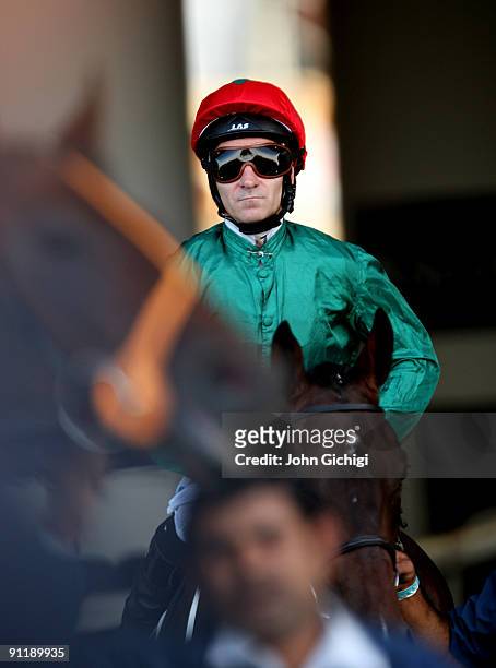 Richard Hills riding Guest Book comes out for The Brightwells Ascot Sales Nursery Handicap Stakes at Ascot Racecourse on September 27, 2009 in Ascot,...