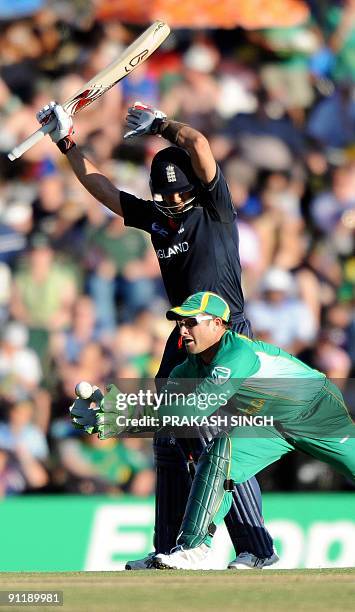 South African wicket keeper Mark Boucher successfully takes the catch of England's batsman Owais Shah off the bowling of Johan Botha during The ICC...