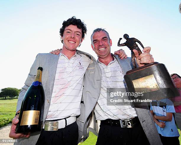Rory McIlroy of Northern Ireland and Paul McGinley, Captain of the Great Britain and Northern Ireland team celebrate after the final day singles...