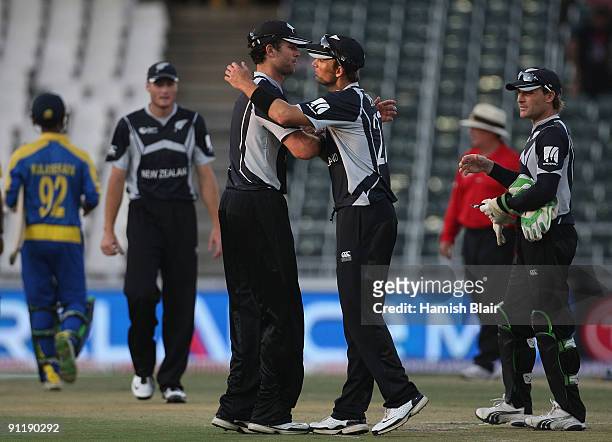 James Franklin and Shane Bond of New Zealand celebrate victory during the ICC Champions Trophy Group B match between New Zealand and Sri Lanka played...