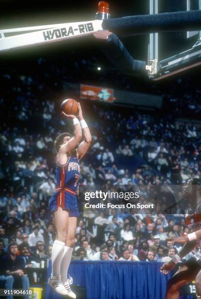 Kelly Tripucka of the Detroit Pistons shoots against the Washington Bullets during an NBA basketball game circa 1983 at the Capital Centre in...