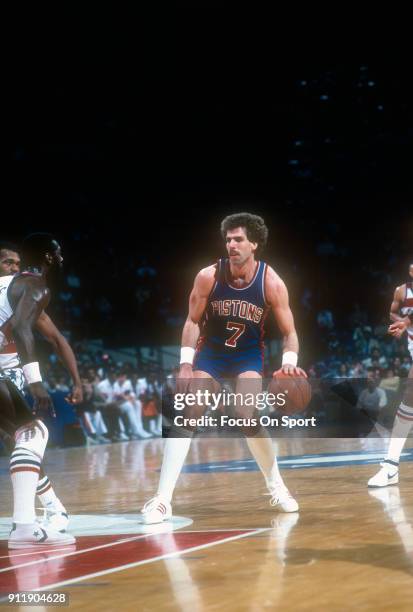 Kelly Tripucka of the Detroit Pistons dribbles the ball against the Washington Bullets during an NBA basketball game circa 1983 at the Capital Centre...