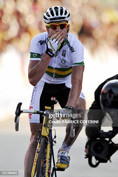 Cadel Evans of Australia celebrates after winning the elite men's road race of the UCI cycling road World Championships on September 27, 2009 in...