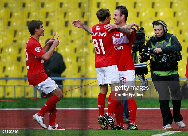 Martin Jiranek , Eldar Nizamutdinov and Alex of FC Spartak Moscow celebrate after scoring a goal during the Russian Football League Championship...