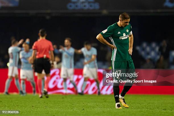 Joaquin Sanchez of Real Betis reacts after Iago Aspas of Celta de Vigo scored the third goal during the La Liga match between Celta de Vigo and Real...