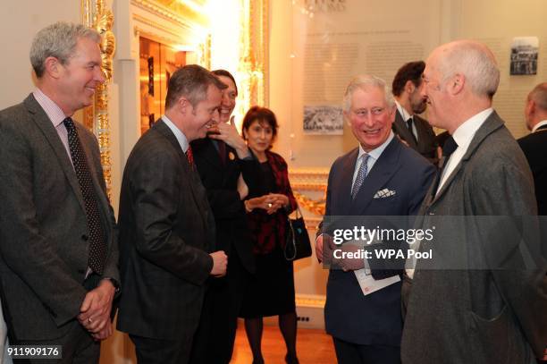 Prince Charles, Prince of Wales is joined by Charles Saumarez Smith secretary and chief executive of the Royal Academy, as they meet directors of...