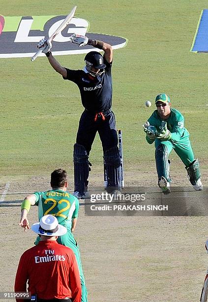 South African wicket keeper Mark Boucher successfully takes the catch of England's batsman Owais Shah off the bowling of Johan Botha during The ICC...