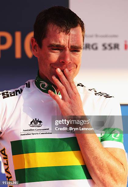 Cadel Evans of Australia stands on the podium after winning the Men's Road Race at the 2009 UCI Road World Championships on September 27, 2009 in...