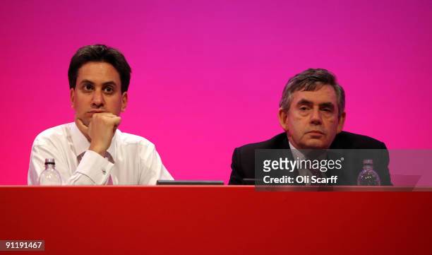 Prime Minister Gordon Brown and Ed Miliband, the Secretary of State for Energy and Climate Change, listen to speeches at the Labour Party Conference...