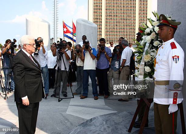 In this handout image provided by the Palestinian Press Office , Palestinian President Mahmoud Abbas arrives in the Cuban Capital on September 27,...