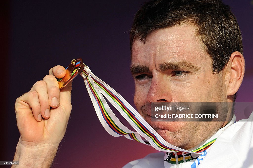 Cadel Evans of Australia shows his gold