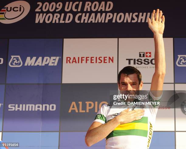 Gold medalist Cadel Evans of Australia celebrates on the podium of the Elite men's world road race championships at Mendrisio on September 27, 2009....