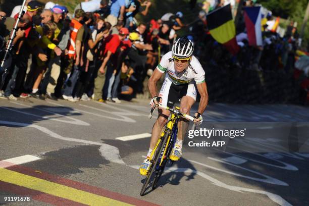 Cadel Evans of Australia powers on his way to win the elite men's road race of the UCI cycling road World Championships on September 27, 2009 in...