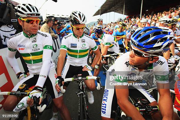 Cadel Evans, Stuart O'Grady and Allan Davis of Australia wait for the start of the Men's Road Race at the 2009 UCI Road World Championships on...