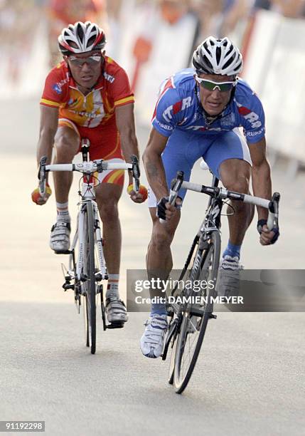 Russia's Alexandr Kolobnev powers to finish second of the Elite men's world road race championships ahead of Spain's Joaquin Rodriguez at Mendrisio...