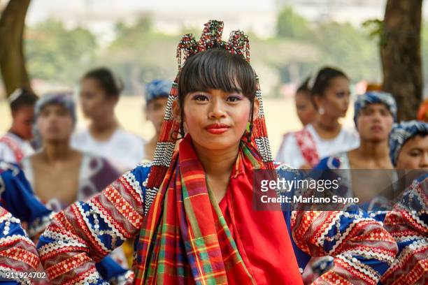 beautiful filipina wearing a festival costume - philippines stock pictures, royalty-free photos & images