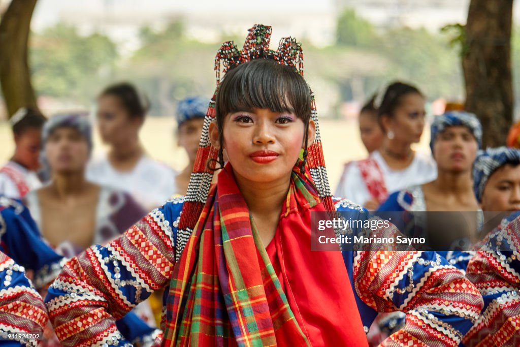 Beautiful filipina wearing a festival costume