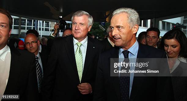 Horst Seehofer , leader of the Christian Social Union and Peter Ramsauer arrive for a press conference during the Election Night Party after first...