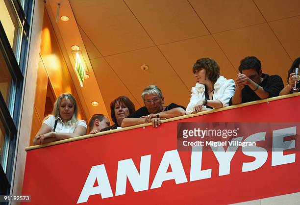 Supporters look on during the Election Night Party after first projections at the SPD headquarter on September 27, 2009 in Berlin, Germany. The SPD...