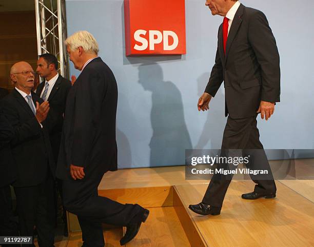 Frank-Walter Steinmeier , candidate of the Social Democratic Party in German Federal Elections, greets Peter Struck, parliamentary group leader of...