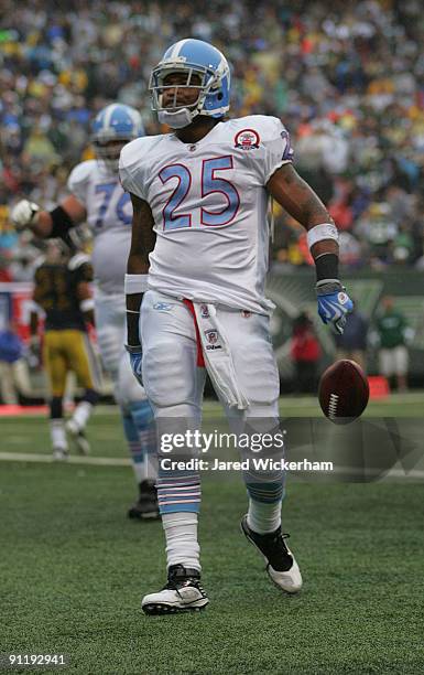 LenDale White of the Tennessee Titans celebrates in the endzone after running in for a touchdown during the game against the New York Jets on...