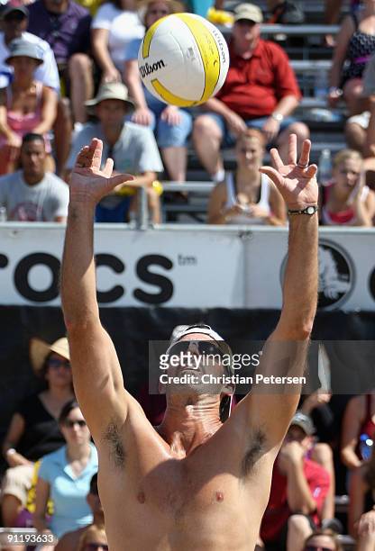 Todd Rogers of USA sets the ball in the gold medal match against Brazil in the AVP Crocs Tour World Challenge at the Westgate City Center on...