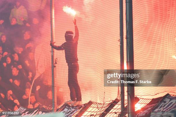 Supporters of Bielefeld fire smokebombs during the Second Bundesliga match between VfL Bochum 1848 and DSC Arminia Bielefeld at Vonovia Ruhrstadion...