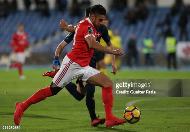 Benfica forward Eduardo Salvio from Argentina with CF Os Belenenses defender Florent Hanin from France in action during the Primeira Liga match...