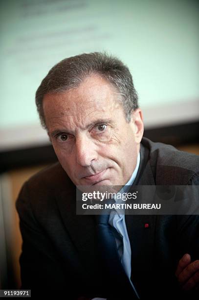 Picture taken on September 24, 2009 in Paris, shows then Veolia Environment head, Henri Proglio, holding a press conference. Proglio is to head...