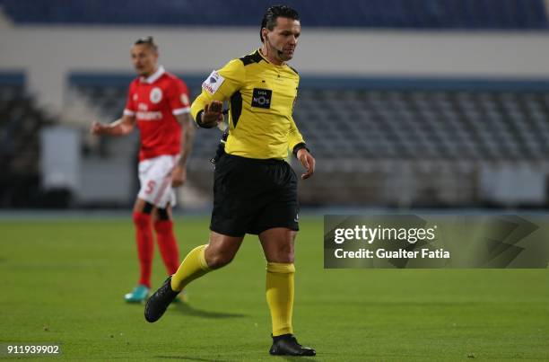 Referee Bruno Paixao in action during the Primeira Liga match between CF Os Belenenses and SL Benfica at Estadio do Restelo on January 29, 2018 in...