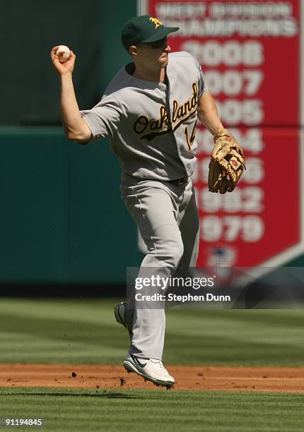 Second baseman Mark Ellis of the Oakland Athletics throws out Erick Aybar of the Los Angeles Angels of Anaheim in the second inning on September 27,...