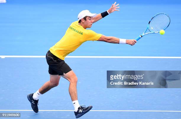 Jordan Thompson of Australia plays a backhand volley during a practice session ahead of the Davis Cup World Group First Round tie between Australia...