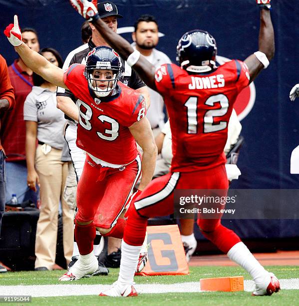 Wide receiver Kevin Walter of the Houston Texans celebrates with Jacoby Jones after his touchdown catch in the second quarter against the...