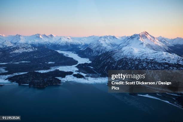 snow covered kenai mountains in winter, kachemak bay state park - kachemak bay stock pictures, royalty-free photos & images